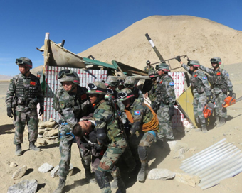 Ladakh: Indian and Chinese armies participate in a day-long exercise focused on humanitarian aid and relief, where a fictitious situation of an earthquake was emulated in Ladakh on Oct 19, 2016. (Photo: IANS)
