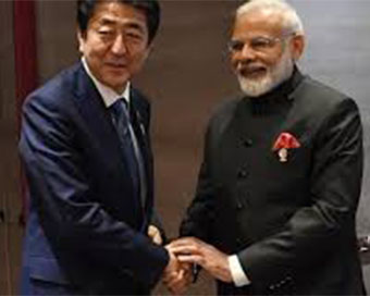 Shinzo Abe with Narendra Modi (file photo)