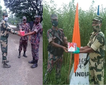 BSF distributes sweets on Indo-Pak and Bangladesh border on the occasion of Bakrid