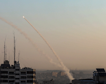 GAZA, Nov. 12, 2019 (Xinhua) -- Militants in the Gaza Strip fire rockets to Israeli cities on Nov. 12, 2019, following its killing of a senior Islamic Jihad commander. Baha Abu al-Atta, a senior militant and leader of al-Quds Brigades, the armed wing