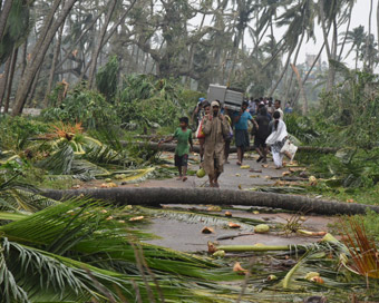 Srikakulam: Uprooted trees block a street after severe cyclonic storm Titli wrecked havoc in Srikakulam district of Andhra Pradesh on Oct 11, 2018. The cyclone, which made landfall between Andhra Pradesh and Odisha early on Thursday, uprooted trees, 