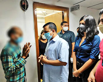 Delhi Chief Minister Arvind Kejriwal with rape victims