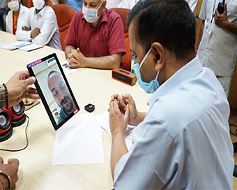 Delhi Chief Minister Arvind Kejriwal on video call