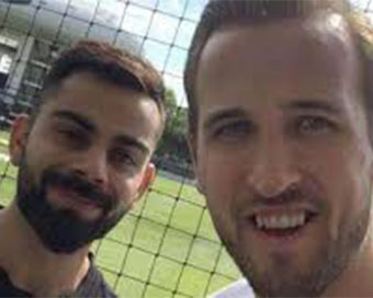 Kohli with Harry Kane (file photo)