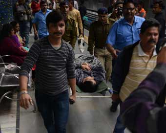 Kolkata: Passengers being taken for treatment after an air-conditioned rake of a metro train in Kolkata caught fire on Dec 27, 2018. Thick smoke was seen coming out of the second compartment of a Dumdum-bound metro rake between Maidan and Rabindra Sa