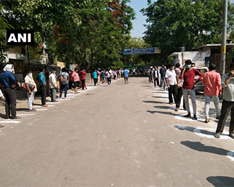 Long queues outside liquor shop