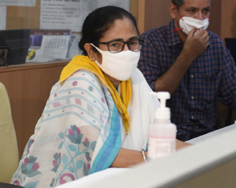 West Bengal Chief Minister Mamata Banerjee monitors the extremely severe cyclonic storm Amphan at Nabanna control room in Howrah on May 20, 2020. 