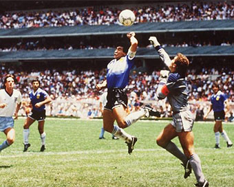 Maradona goes off to shake the 