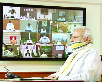 New Delhi : Prime Minister Narendra Modi interacts with Chief Ministers of States on COVID-19 situation through video conferencing, in New Delhi on Monday. (ANI Photo)