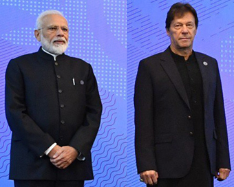 Prime Minister Narendra Modi and Pakistan Prime Minister Imran Khan at the SCO (Shanghai Cooperation Organisation) Council of Heads of State Meeting in Bishkek, Kyrgyzstan on June 14, 2019. (File Photo: IANS)