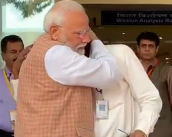 ISRO chief breaks down, Modi hugs, consoles him