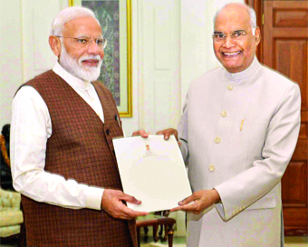 New Delhi: President Ram Nath Kovind appoints Narendra Modi to the office of Prime Minister of India at Rashtrapati Bhavan in New Delhi, on May 25, 2019.  A day after Prime Minister Narendra Modi tendered resignation of his Council of Ministers, Pres