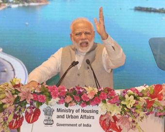  Lucknow: Prime Minister Narendra Modi addresses during the event "Transforming Urban Landscape: Third Anniversary of Pradhan Mantri Awas Yojana (Urban), Atal Mission for Rejuvenation of Urban Transformation (AMRUT) and the Smart Cities Mission" in