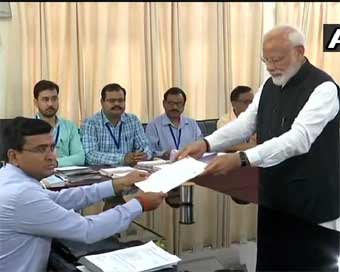 Modi files nomination in Varanasi, shows off NDA strength