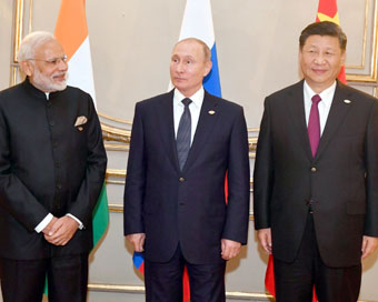 Buenos Aires: Prime Minister Narendra Modi, Russian President Vladimir Putin and Chinese President Xi Jinping at the RIC (Russia, India, China) Informal Summit, in Buenos Aires, Argentina on Nov 30, 2018. (Photo: IANS/PIB)