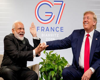 Biarritz: Prime Minister Narendra Modi meets US President Donald Trump on the sidelines of the G7 Summit in Biarritz, France on Aug 26, 2019. (Photo: IANS)