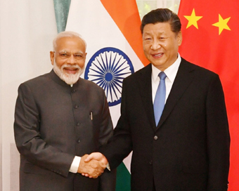 Bishkek: Prime Minister Narendra Modi meets Chinese President Xi Jinping on the sidelines of the SCO Summit in Bishkek, Kyrgyz Republic on June 13, 2019. (Photo: IANS/PIB)