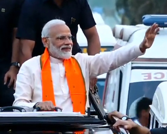 Bhubaneswar: Prime Minister Narendra Modi during a roadshow in Bhubaneswar, on April 16, 2019. (Photo: IANS)