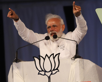 Bengaluru: Prime Minister Narendra Modi during a BJP rally at Palace Grounds, in Bengaluru on April 13, 2019. (Photo: IANS)