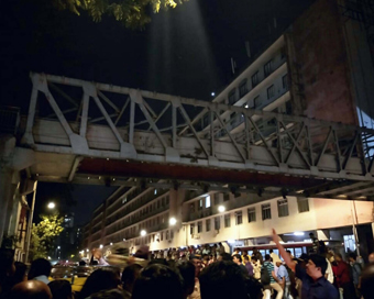 Mumbai: At least 12 commuters were injured when a portion of a pedestrian bridge crashed near the Chhatrapati Shivaji Terminus in Mumbai on March 14, 2019. (Photo: IANS)