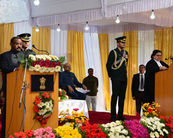 Srinagar: Chief Justice of Jammu and Kashmir High Court, Geeta Mittal administers the oath of office to Girish Chandra Murmu as the first Lieutenant Governor of the newly-formed Union Territory of Jammu and Kashmir, at an oath-taking ceremony at Raj 
