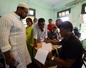 Nagaon: People get their names checked on the draft list at a National Register of Citizens (NRC) Centre in Nagaon, after an additional exclusion list comprising the names of 1,02,462 persons to the draft NRC was published in Assam, on June 26, 2019.