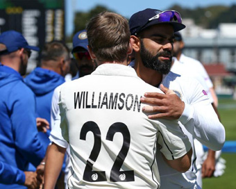 India captain Virat Kohli hugging Kiwi skipper Kane Williamson after the match