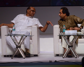 Mumbai: NCP chief Sharad Pawar interacts with Shiv Sena chief Uddhav Thackeray during the Centenary celebration ceremony of Saraswat Bank in Mumbai on Sept 15, 2018. (Photo: IANS)