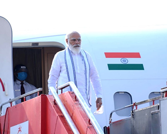 PM Modi reaches Ahmedabad to inaugurate, lay stones of 21 projects at Kevadiya