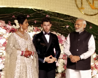 New Delhi: Prime Minister Narendra Modi with actress Priyanka Chopra and Nick Jonas at their wedding reception in New Delhi on Dec 4, 2018. (Photo: IANS)