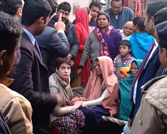 Bijnor: Congress General Secretary Priyanka Gandhi Vadra meets the family members of two persons, who where killed in recent violence over the Citizenship Amendment Act in Bijnor, Uttar Pradesh, on Dec 22, 2019. (Photo: IANS)