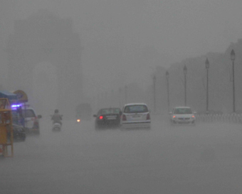 New Delhi: Rains lash New Delhi on July 15, 2019. (Photo: Bidesh Manna/IANS)