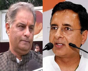 Late Rajiv Tyagi (left), Randeep Singh Surjewala (right)