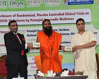 Hours after announcement, Ramdev told to stop Corona 