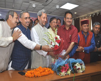 11 ministers inducted in Tirath Singh Rawat government