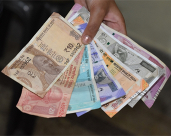 Rupee falls 30 paise to hit record low of 77.55 against US Dollar