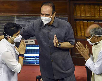 Digvijaya, Scindia greet each other in Rajya Sabha