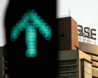 Sensex, Nifty hit record highs on vaccine hopes