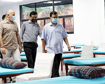 Sisodia and Kejriwal at Covid Care Centre in CWG Village
