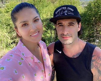 Actress Sunny Leone with her husband Daniel Weber