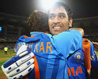 Sachin Tendulkar hugging MS Dhonia fter winning the 201 WC