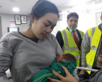 Thai woman gives birth on board
