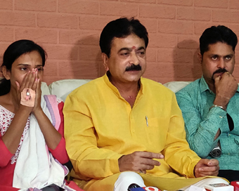 Ahmedabad BJP MLA Balram Thawani holds a press conference after he was caught on camera roughing up and kicking a woman on a street following which Gujarat BJP directed him to apologize, in Ahmedabad on June 3, 2019. Also seen Nitu Tejwani, a municip