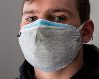 Shield yourself from Covid with three-layered masks: Experts