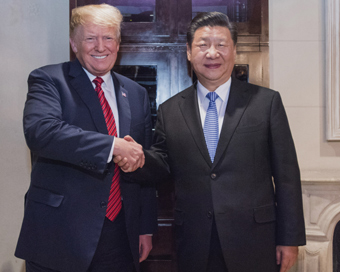 BUENOS AIRES, Dec. 1, 2018 (Xinhua) -- Chinese President Xi Jinping (R) meets with his U.S. counterpart Donald Trump in Buenos Aires, Argentina, Dec. 1, 2018. President Xi attended a working dinner with President Trump in Buenos Aires on Saturday. (X