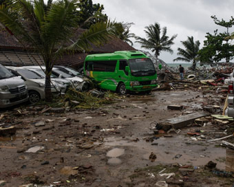PANDEGLANG, Dec. 23, 2018 (Xinhua) -- Vehicles are seen among the debris after a tsunami hit Sunda Strait in Pandeglang, Banten province, in Indonesia, Dec. 23, 2018. The total casualty of a tsunami triggered by the eruption of Krakatau Child volcano