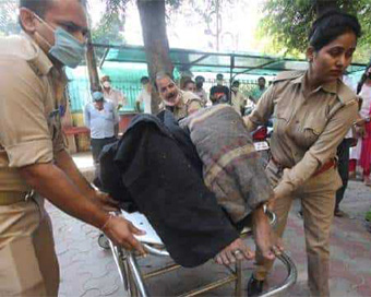 Woman who set herself ablaze in front of UP Assembly, dies