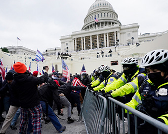 One person shot as Trump supporters storm US Senate, chaos in Washington