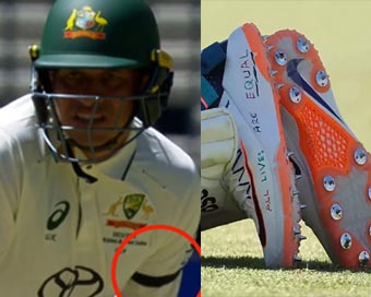 Usman Khawaja wears black armband in Perth Test after ban over wearing shoes with messages