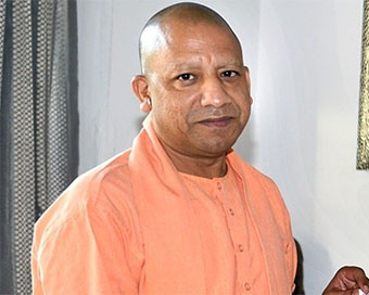 Yogi meets kin of Bikru massacre victims